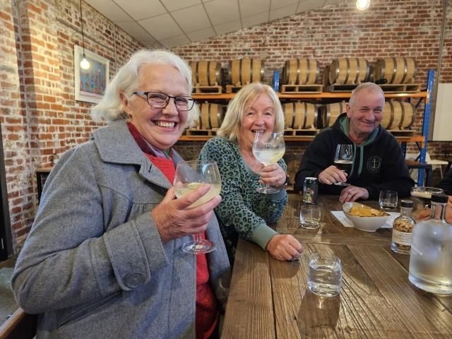 Bronwyn, Vicki and Garry enjoying a cocktail and beer