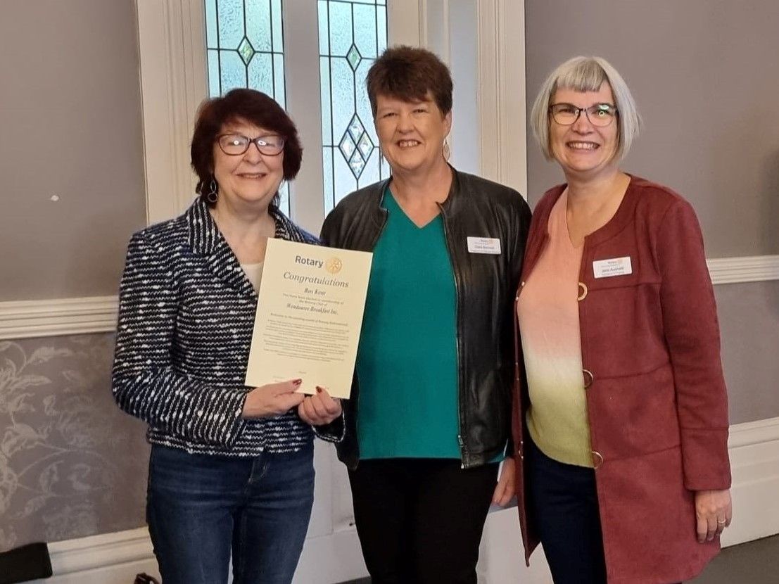 New Member Roslyn Kent, pictured with Sponsor Clare and Past President Jane at Induction. 